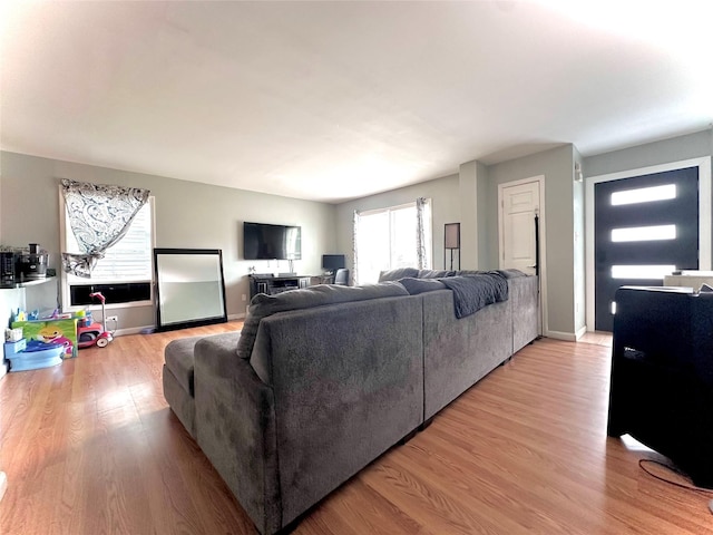 37 E Fulton St, Lido Beach, NY 11561 - living area with light wood-type flooring and baseboards