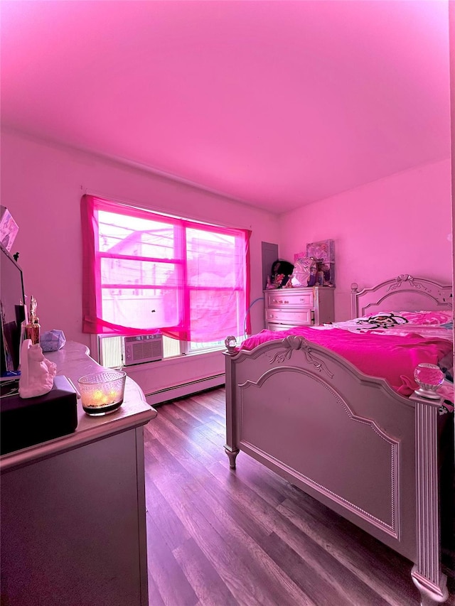 37 E Fulton St, Lido Beach, NY 11561 - bedroom with a baseboard radiator and wood finished floors