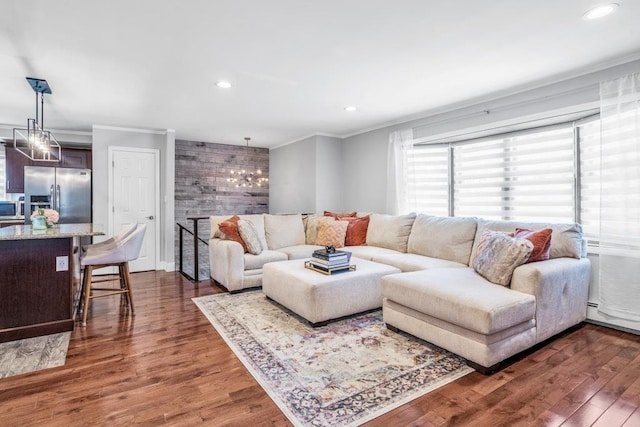 544 S 15th St, Lindenhurst, NY 11757 - living area featuring ornamental molding, dark wood-style floors, recessed lighting, a chandelier, and a baseboard radiator