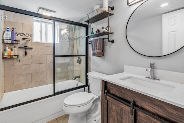 544 S 15th St, Lindenhurst, NY 11757 - full bathroom with vanity, bath / shower combo with glass door, and tile patterned flooring