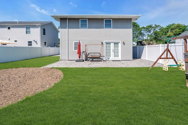 544 S 15th St, Lindenhurst, NY 11757 - back of house featuring a patio area, a fenced backyard, and french doors