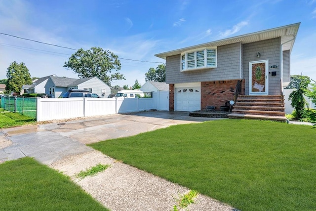 544 S 15th St, Lindenhurst, NY 11757 - view of front of property featuring concrete driveway, a garage, brick siding, and entry steps