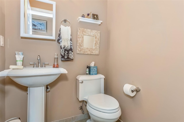 122 Maya Cir, Central Islip, NY 11722 - half bathroom featuring toilet and baseboards