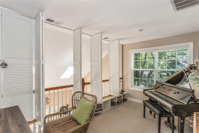 122 Maya Cir, Central Islip, NY 11722 - living area featuring carpet floors and baseboards