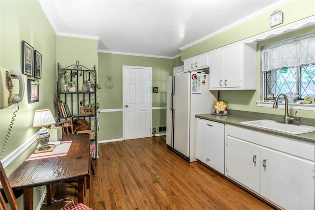 29 Cardinal Ln, Hauppauge, NY 11788 - kitchen with white appliances, white cabinetry, crown molding, and dark wood-style floors