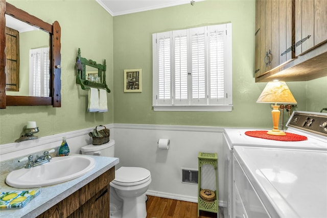 29 Cardinal Ln, Hauppauge, NY 11788 - bathroom featuring washer and clothes dryer, vanity, wood finished floors, and crown molding