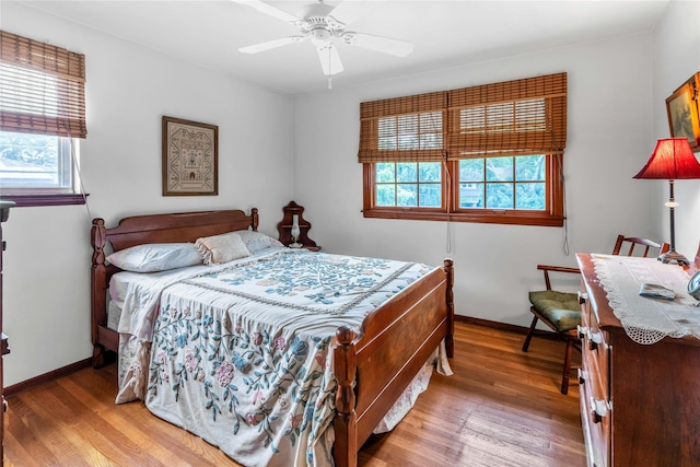 29 Cardinal Ln, Hauppauge, NY 11788 - bedroom with light wood finished floors and ceiling fan