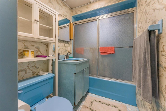 4026 Wickham Ave, Bronx, NY 10466 - bathroom with bath / shower combo with glass door, vanity, and tile patterned floors