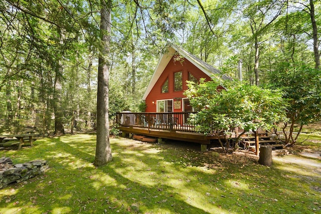16 Canal Rd, Wurtsboro, NY 12790 - back of property featuring a wooden deck and a lawn
