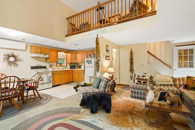 16 Canal Rd, Wurtsboro, NY 12790 - living room featuring a wall unit AC, stairs, a high ceiling, and light carpet