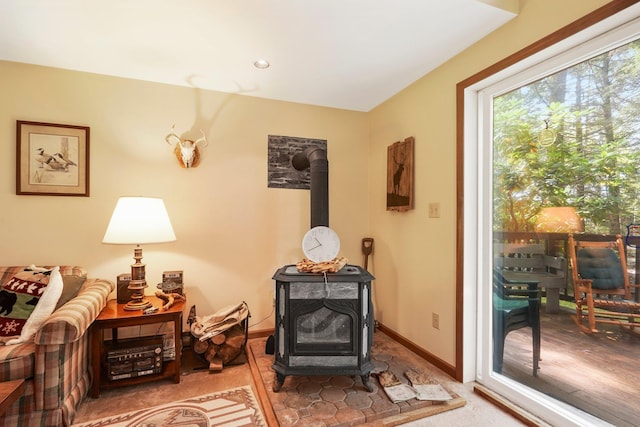 16 Canal Rd, Wurtsboro, NY 12790 - sitting room featuring a wood stove and baseboards