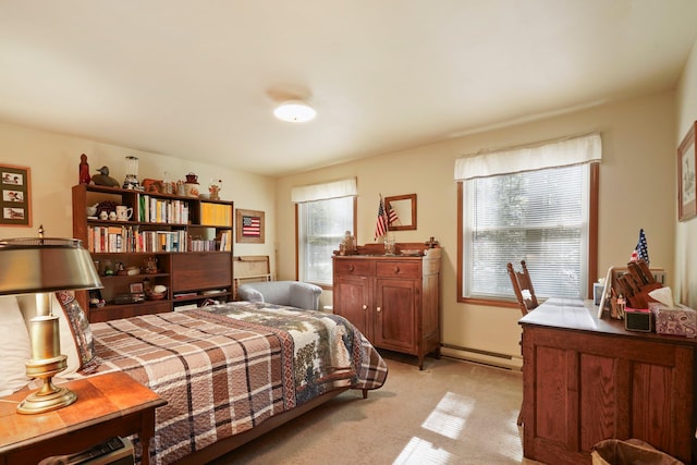 16 Canal Rd, Wurtsboro, NY 12790 - bedroom featuring multiple windows, light carpet, and a baseboard heating unit