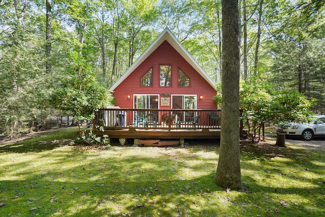 16 Canal Rd, Wurtsboro, NY 12790 - rear view of house featuring a deck and a lawn