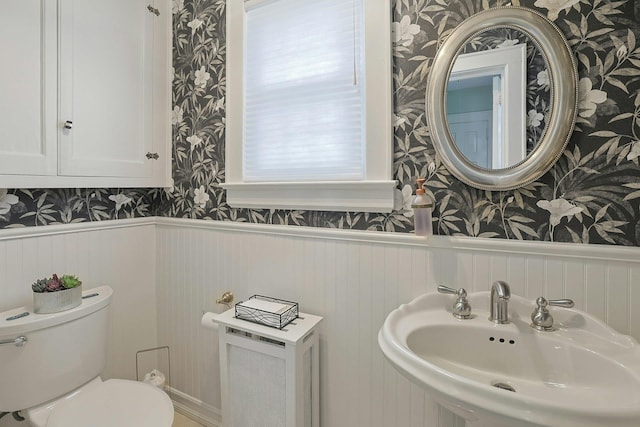 41 Cowdrey St, Yonkers, NY 10701 - bathroom featuring wallpapered walls and wainscoting