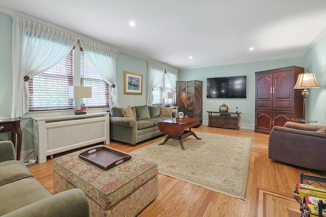 41 Cowdrey St, Yonkers, NY 10701 - living area featuring radiator, ornamental molding, light wood-type flooring, and recessed lighting