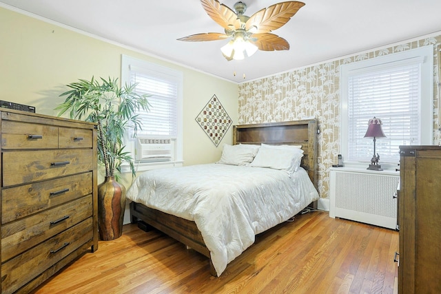 41 Cowdrey St, Yonkers, NY 10701 - bedroom featuring hardwood / wood-style floors, ornamental molding, cooling unit, and ceiling fan