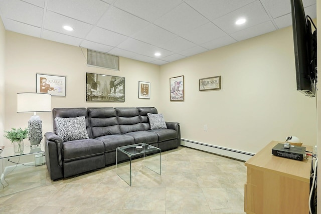 41 Cowdrey St, Yonkers, NY 10701 - living room featuring a baseboard heating unit, recessed lighting, and a drop ceiling