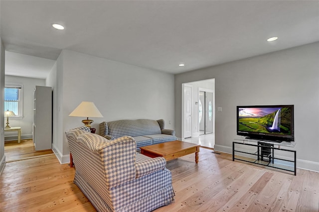 17 Singworth St, Oyster Bay, NY 11771 - living room with light wood finished floors and recessed lighting