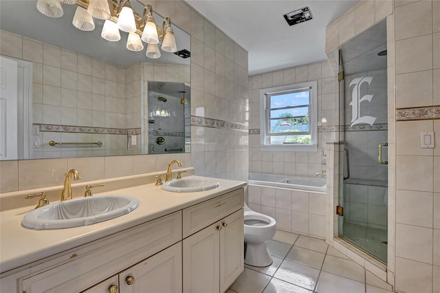 17 Singworth St, Oyster Bay, NY 11771 - full bath with tile walls, tile patterned flooring, a garden tub, a shower stall, and double vanity