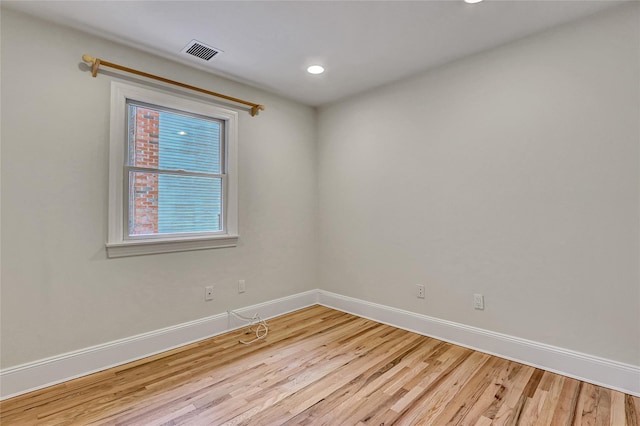 17 Singworth St, Oyster Bay, NY 11771 - empty room featuring light wood-style flooring and recessed lighting