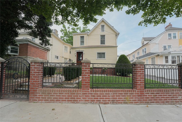 71 Dell Ave, Mount Vernon, NY 10553 - view of front of house with a fenced front yard and a gate