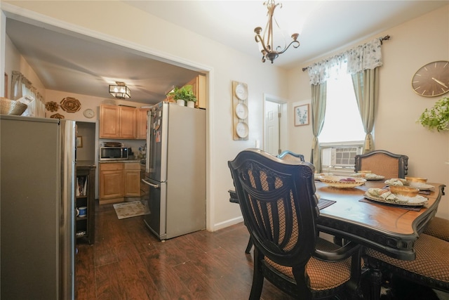 71 Dell Ave, Mount Vernon, NY 10553 - dining area with dark wood finished floors, a chandelier, and cooling unit