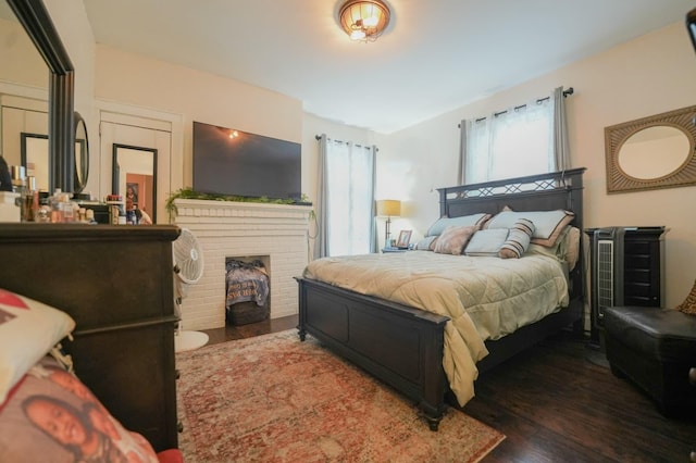 71 Dell Ave, Mount Vernon, NY 10553 - bedroom with wood finished floors and a brick fireplace