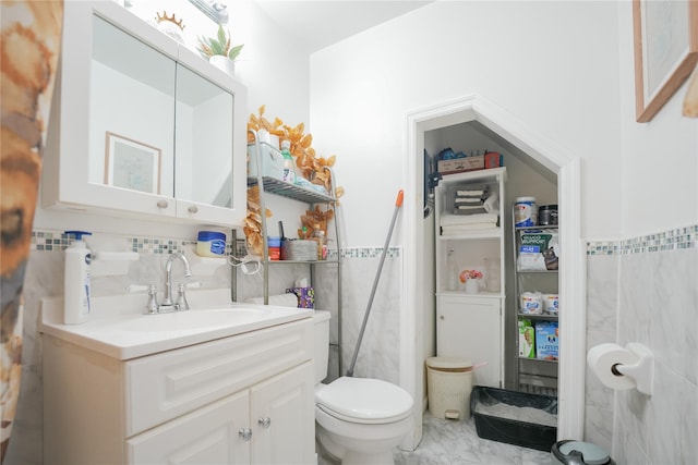 71 Dell Ave, Mount Vernon, NY 10553 - bathroom with tile walls, vanity, and wainscoting