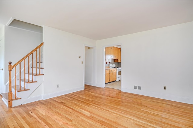 33 Grandview Ave, Pawling, NY 12564 - spare room with light wood finished floors and stairs