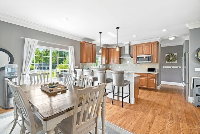 4 Brianna Ln, Yorktown Heights, NY 10598 - dining space featuring ornamental molding, light wood-style flooring, and recessed lighting