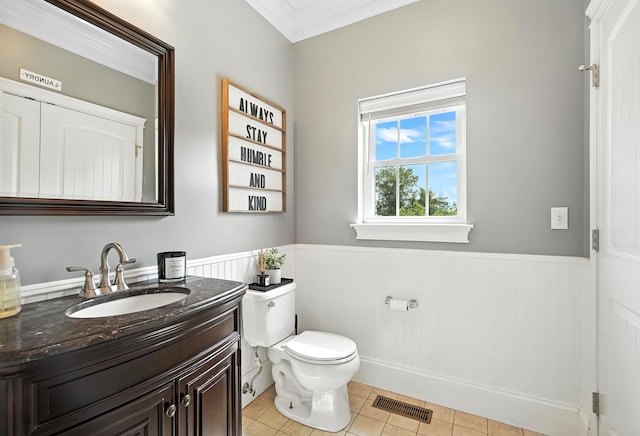 4 Brianna Ln, Yorktown Heights, NY 10598 - bathroom with wainscoting, vanity, crown molding, and tile patterned flooring