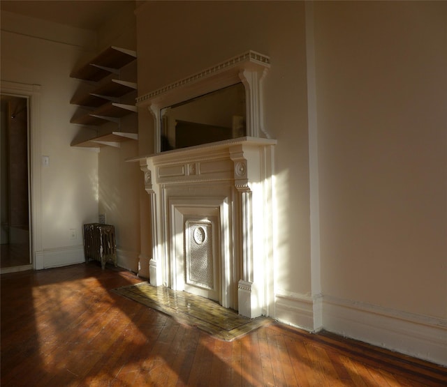 30 Edgecombe Ave, New York Manhattan, NY 10030 - unfurnished living room featuring hardwood / wood-style flooring and baseboards