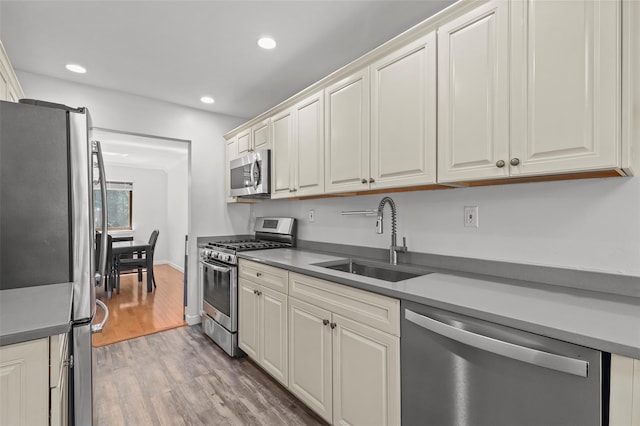 24 Wild Birch Farms, Cortlandt Manor, NY 10567 - kitchen featuring appliances with stainless steel finishes, wood finished floors, and recessed lighting