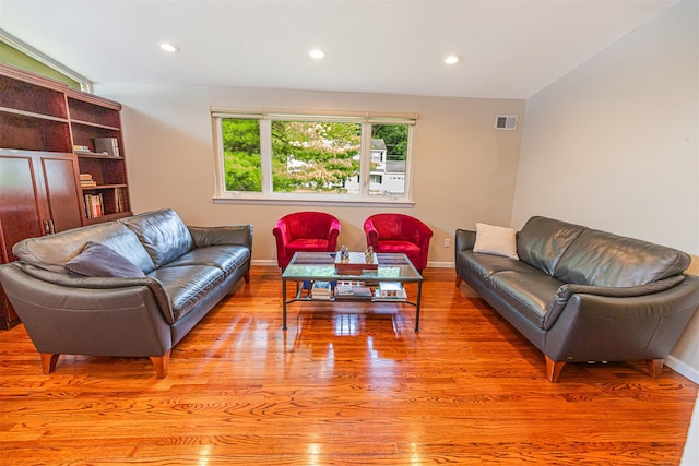 21 Brockton Rd, Spring Valley, NY 10977 - living room with light wood finished floors and recessed lighting