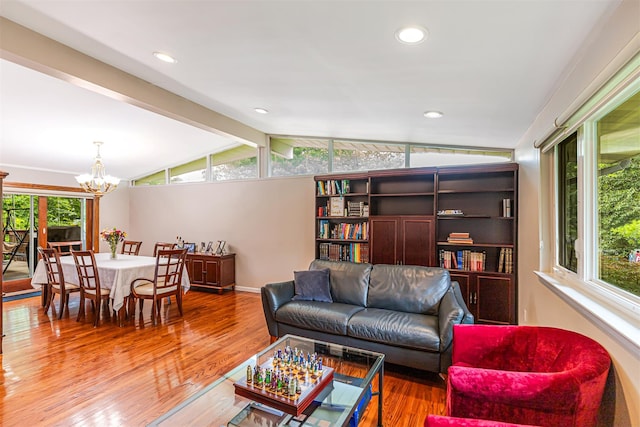 21 Brockton Rd, Spring Valley, NY 10977 - living room featuring a chandelier, wood finished floors, healthy amount of natural light, and recessed lighting