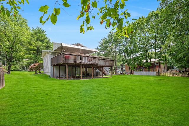 21 Brockton Rd, Spring Valley, NY 10977 - back of property with stairway and a wooden deck