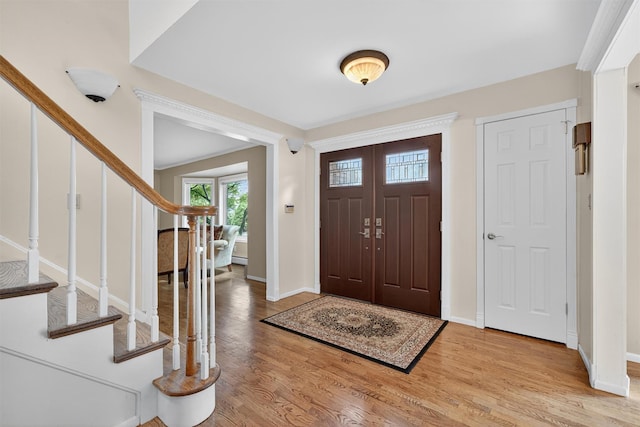 70 Walter Dr, Stony Point, NY 10980 - foyer entrance with stairway and light wood finished floors