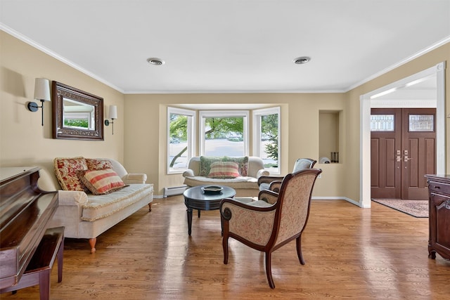 70 Walter Dr, Stony Point, NY 10980 - living room with crown molding, light wood finished floors, and baseboard heating