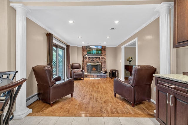 70 Walter Dr, Stony Point, NY 10980 - living room with decorative columns, a baseboard radiator, ornamental molding, light tile patterned flooring, and recessed lighting