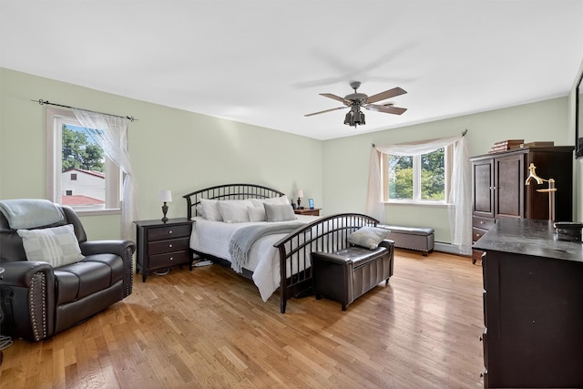 70 Walter Dr, Stony Point, NY 10980 - bedroom with light wood finished floors and a ceiling fan