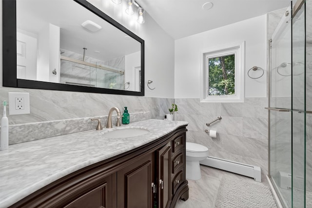 70 Walter Dr, Stony Point, NY 10980 - bathroom with a baseboard radiator, tile walls, vanity, a stall shower, and wainscoting