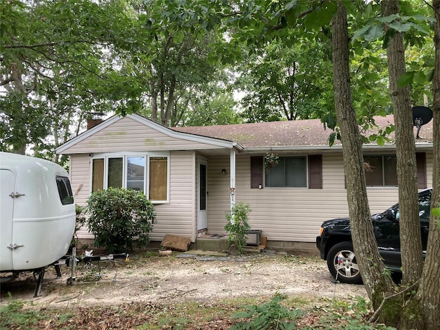 46 Violet Rd, Rocky Point, NY 11778 - view of front of property featuring a shingled roof