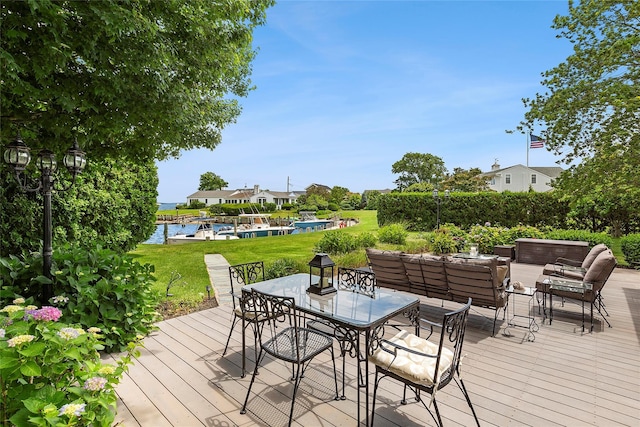315 Old Salt Rd, Mattituck, NY 11952 - wooden terrace with a water view, a lawn, outdoor lounge area, and outdoor dining space