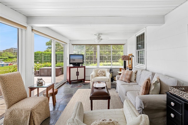 315 Old Salt Rd, Mattituck, NY 11952 - sunroom / solarium with outdoor lounge area, plenty of natural light, stone finish flooring, and a ceiling fan