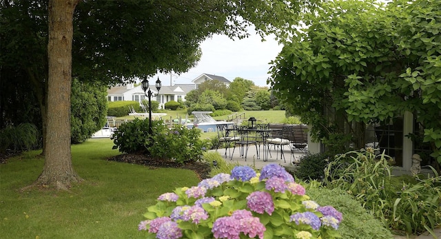 315 Old Salt Rd, Mattituck, NY 11952 - view of property's community featuring a patio and a yard