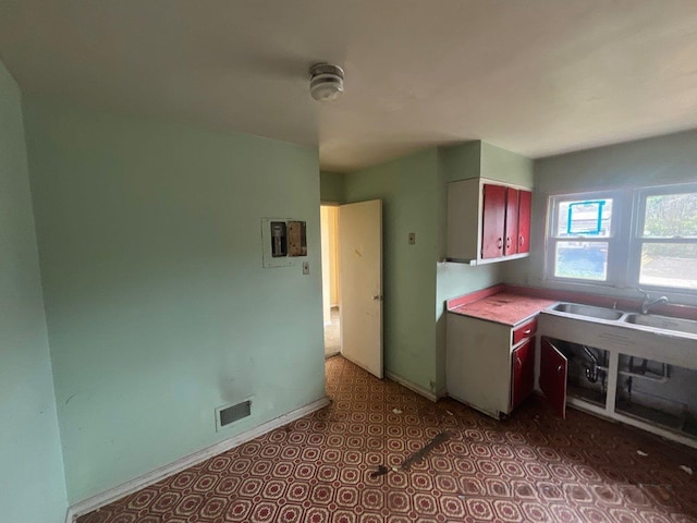 625 Edwards St Unit A, Westhampton Beach, NY 11978 - kitchen with tile patterned floors and light countertops