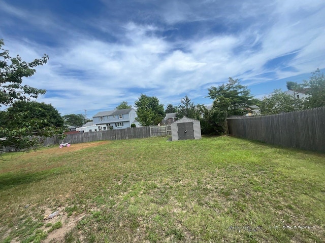 625 Edwards St Unit A, Westhampton Beach, NY 11978 - fenced backyard featuring a shed