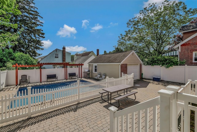 502 S 11th St, New Hyde Park, NY 11040 - view of pool with a fenced backyard, an outdoor structure, a pergola, and a patio