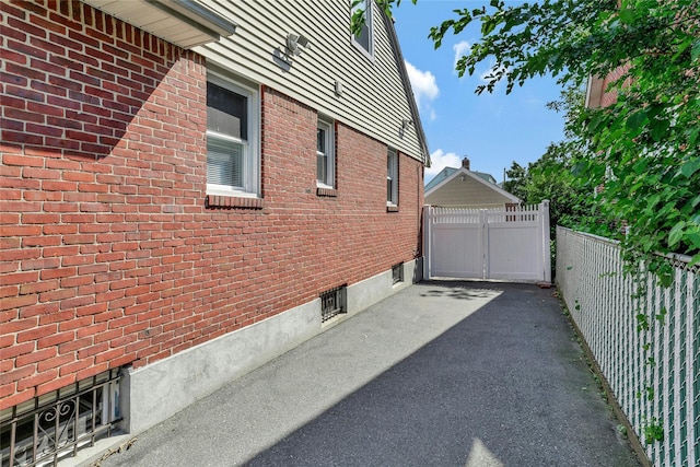 502 S 11th St, New Hyde Park, NY 11040 - view of home's exterior with brick siding