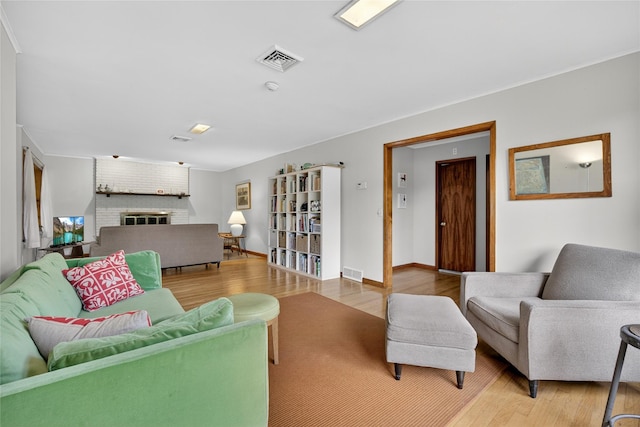 7641 N Broadway, Red Hook, NY 12571 - living room with wood finished floors and a fireplace